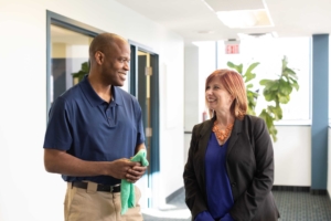 Facility services associate with a client in a commercial workplace