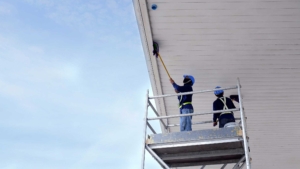 Special Services associates performing high exterior cleaning of a commercial facility